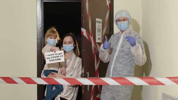 Doctor in Medical Suit Visiting Patient Entrance Corridor Sick Family of Mother and Child Girl Home