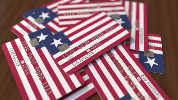 Pile of Credit Cards with Flag of Liberia