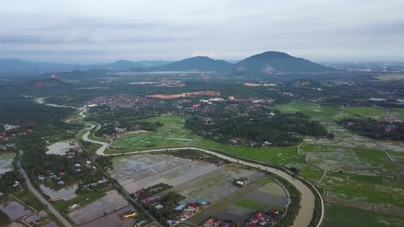 Drone view Malays kampung near the green forest