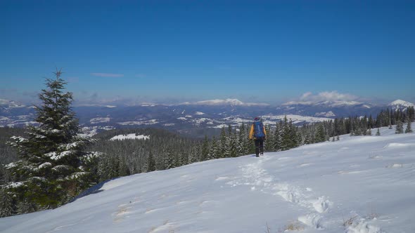 Man Backpacker Tourist Walking Snow Landscape