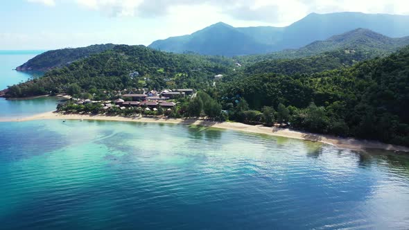 Aerial tourism of idyllic resort beach adventure by blue sea with bright sandy background of a dayou