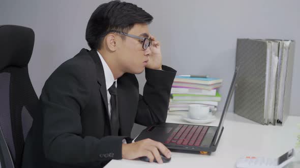 young business man using laptop computer