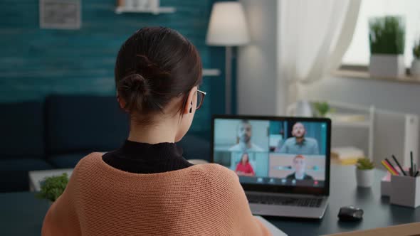 Female Student Talking on Online Class Video Call to Study