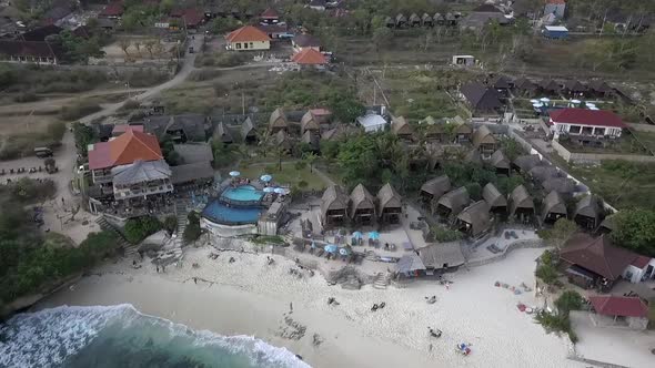 Spectacular high aerial view flight top down drone footage ot idyllic dream beach with beachfront re