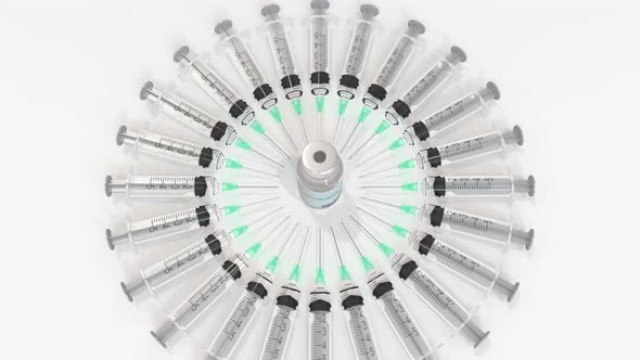 Bottle with Norovirus Vaccine and Syringes alt