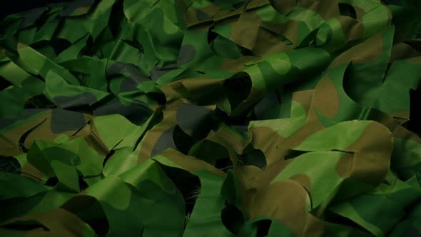 Military Camo Covering Fabric Moving Shot alt