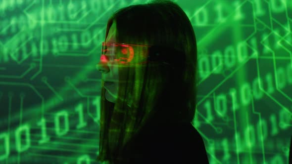 Female Coder Checking Data and Data Code on the Background