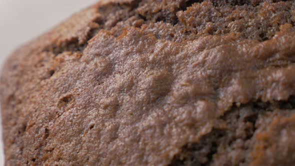Shiny choco cake glazed surface close-up cracks after baking panning  4K 2160p 30fps UltraHD video -