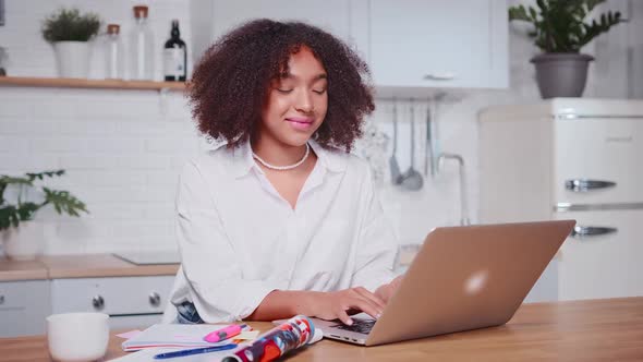 Young Attractive African American Woman Leaning at Modern Cozy Home