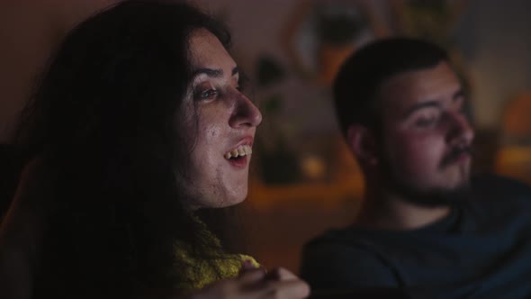 Couple Watching Movie at Home Together