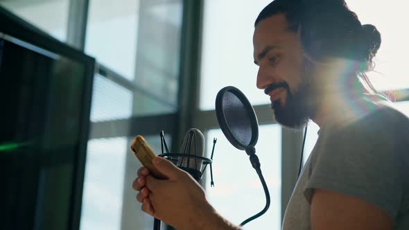 The Announcer Records the Advertising Text at the Recording Studio