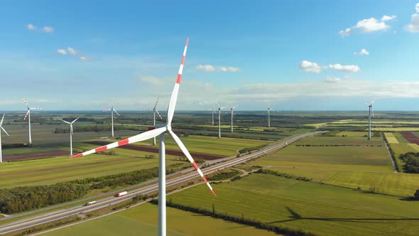 Aerial View of Wind Turbines Farm and Agricultural Fields. Austria