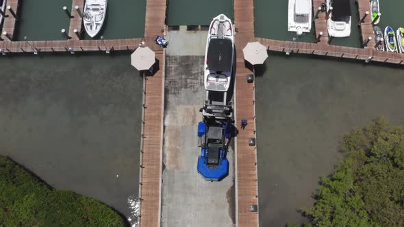  Aerial View on Loader Truck Hauls the Yacht He Boat Launch Ramp, Miami alt