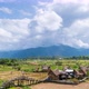 Rice paddy farming filed and village at Pua district Nan province, Thailand; zoom in - time lapse - VideoHive Item for Sale