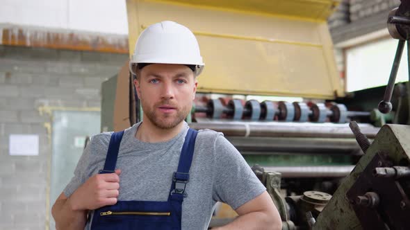 Portrait of a Professional Worker in an Industrial Workshop