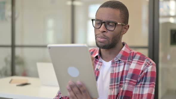 Online Video Chat on Tablet By African Man