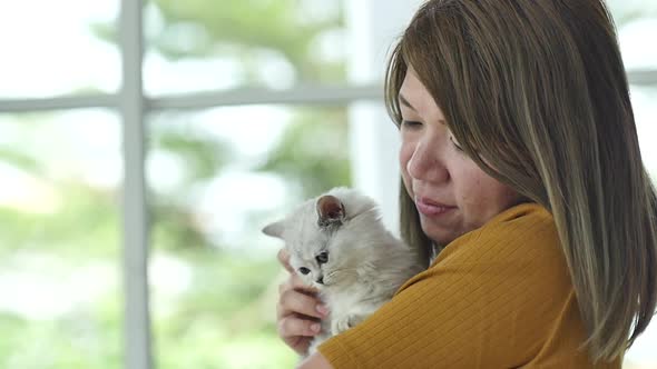 Beautiful Asian Woman Holding Cute Kitten,Slow Motion