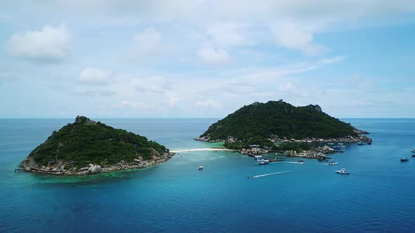 Slowing aerial view of the popular Nang Yuan islands near Koh Tao, Thailand