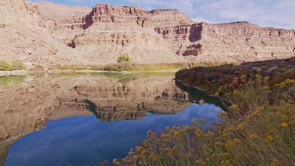 Colorful desert landscape reflecting in the Green River