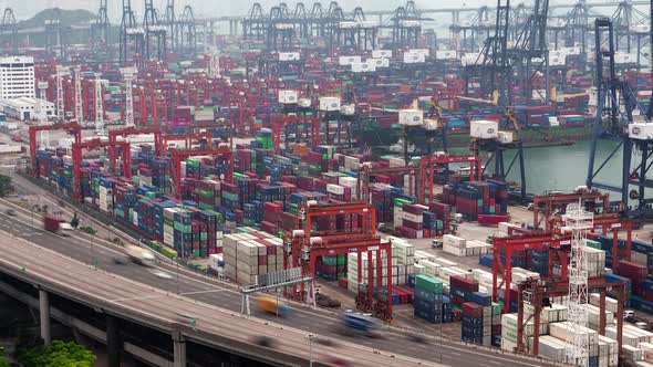 Timelapse Cranes Operate Loading Cargo Vessel in Hong Kong