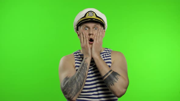 Young Sailor Man Expresses Shock, Looks Surprised. Seaman Guy in Sailor's Vest