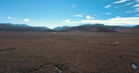 Aerial View of Clarence River New Zealand, Mountains in the Background - Dolly In Shot