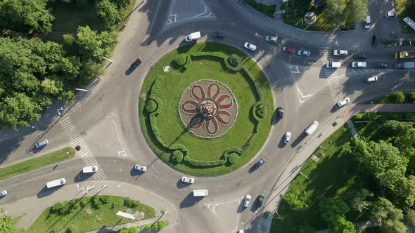  Aerial View of Roundabout Road with Circular Cars in Small European City at Sunny Day