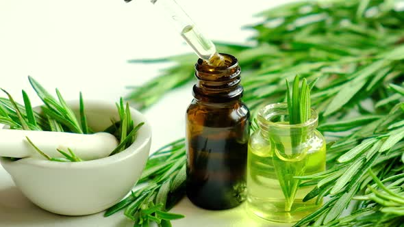 Rosemary Essential Oil in a Small Bottle