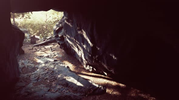 Breathtaking Scenery of Bright Sun Rays Falling Inside a Cave Illuminating