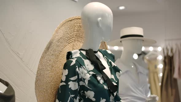Mannequins in Trendy Female Clothes in Contemporary Fashion Store