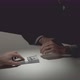 Businessman giving bribe money to his partner in dark room - VideoHive Item for Sale