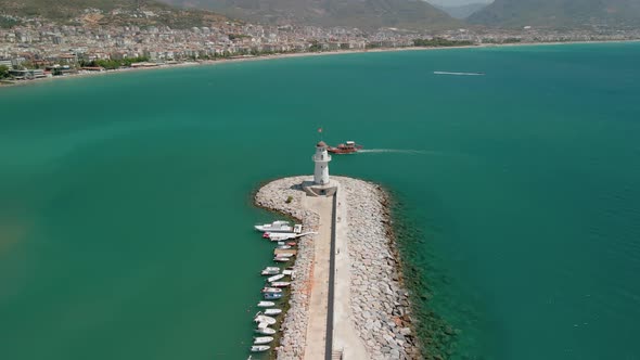 The Drone Flies to the Lighthouse in the Port of Alanya