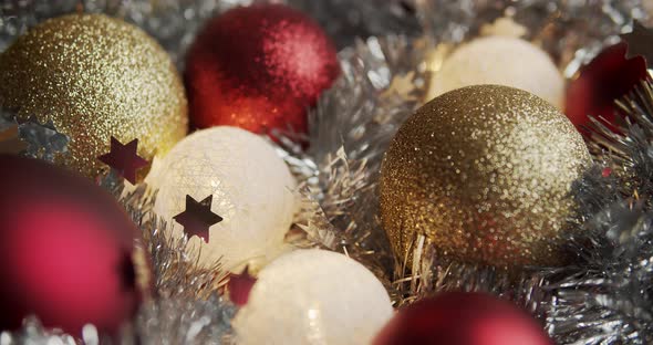 Beautiful Red and Gold Baubles on a Christmas Background