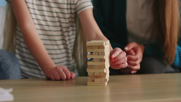 Family Plays Jenga