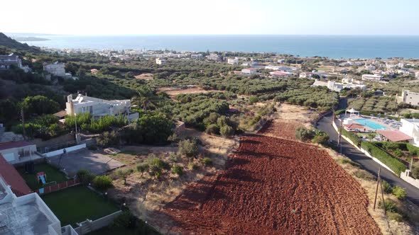 Aerial Nature Greek Landscape with Sea Mountain Olive Trees and Houses in Crete