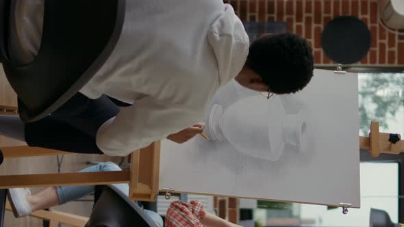 Vertical Video Creative Student Taking Picture of Vase Sketch on Smartphone