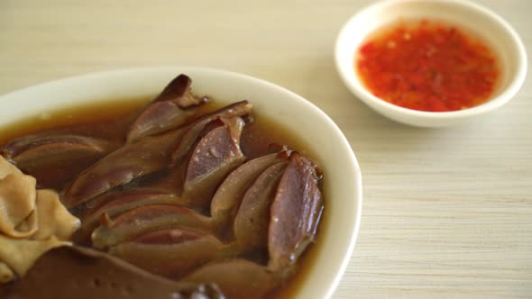stewed duck offal in brown soup - Asian food style