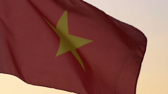 Vietnam Flag Waving Over Sunset Sky