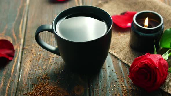 Mug of Drink and Red Roses