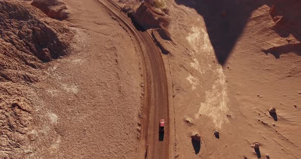 Top Down View Over the Road in an Unusual Desert Terrain of the Moon Valley in Atacama Desert, Chile