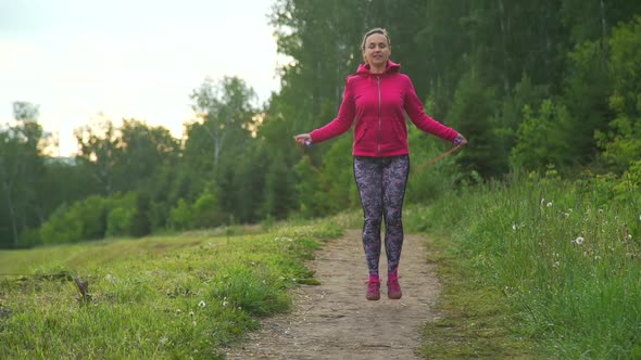 Woman Doing Skipping Workout in the Morning