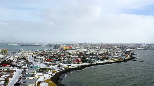 Drone aerial over the shoreline of the city of Reykjavik in Iceland