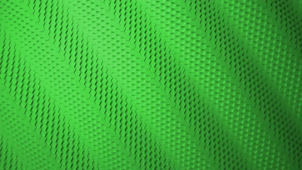 Wave motion mosaic surface with moving green hexagons.