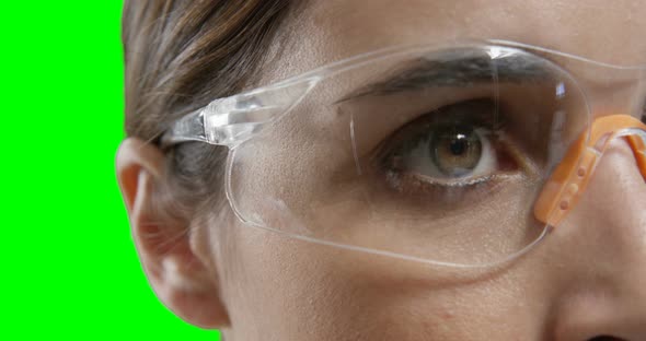 Close-up of woman wearing protective eyewear