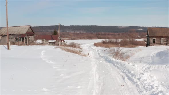 Russian Road in the Winter. Winter Road in the Village. Winter Landscape in the Village Shot From a