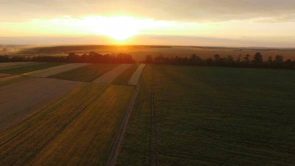 Amazing Huge Sunset on Fields Horizon. Aerial View