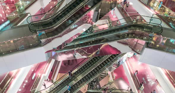 Time Lapse Escalators in Modern Shopping Mall Crowd of People