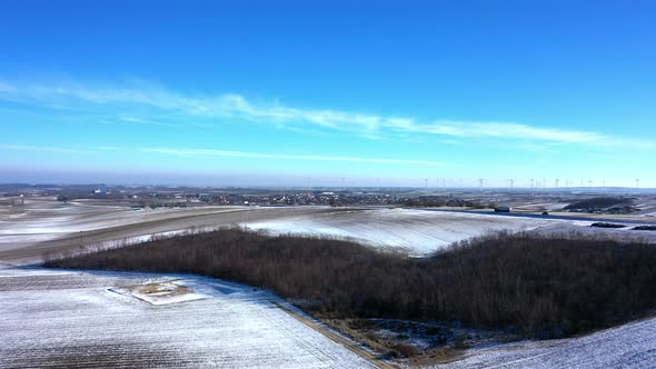 Wintry Landscape With Fall Foliage In Zistersdorf, Lower Austria. Wind Farm In Distant Background. w