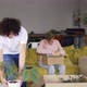 Homosexual Couple Move to a New Apartment Unpacking Boxes - VideoHive Item for Sale