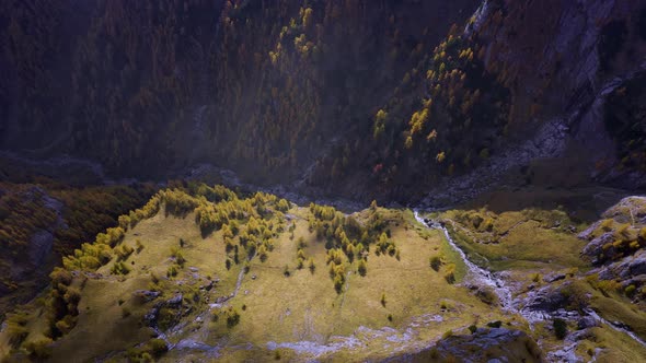 Aerial view of a mountain valley in autumn season. Mountain ridge.